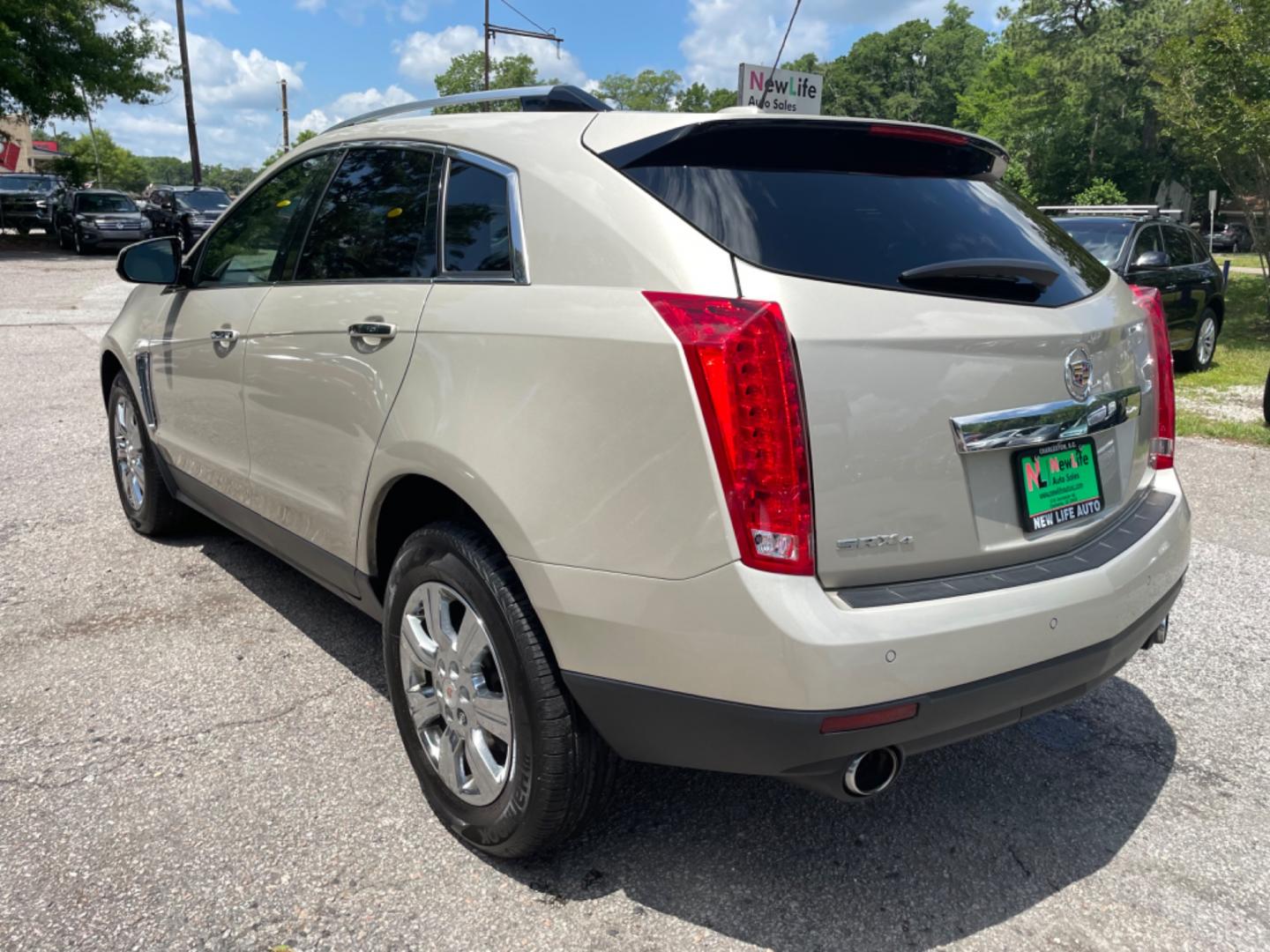 2016 SILVER CADILLAC SRX LUXURY COLLECTION (3GYFNEE33GS) with an 3.6L engine, Automatic transmission, located at 5103 Dorchester Rd., Charleston, SC, 29418-5607, (843) 767-1122, 36.245171, -115.228050 - Photo#4